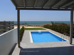 Beachfront villa in Ayia Napa hotel area with title deeds and sandy shore