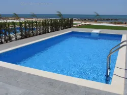Beachfront villa in Ayia Napa next to the sea with large swimming pool
