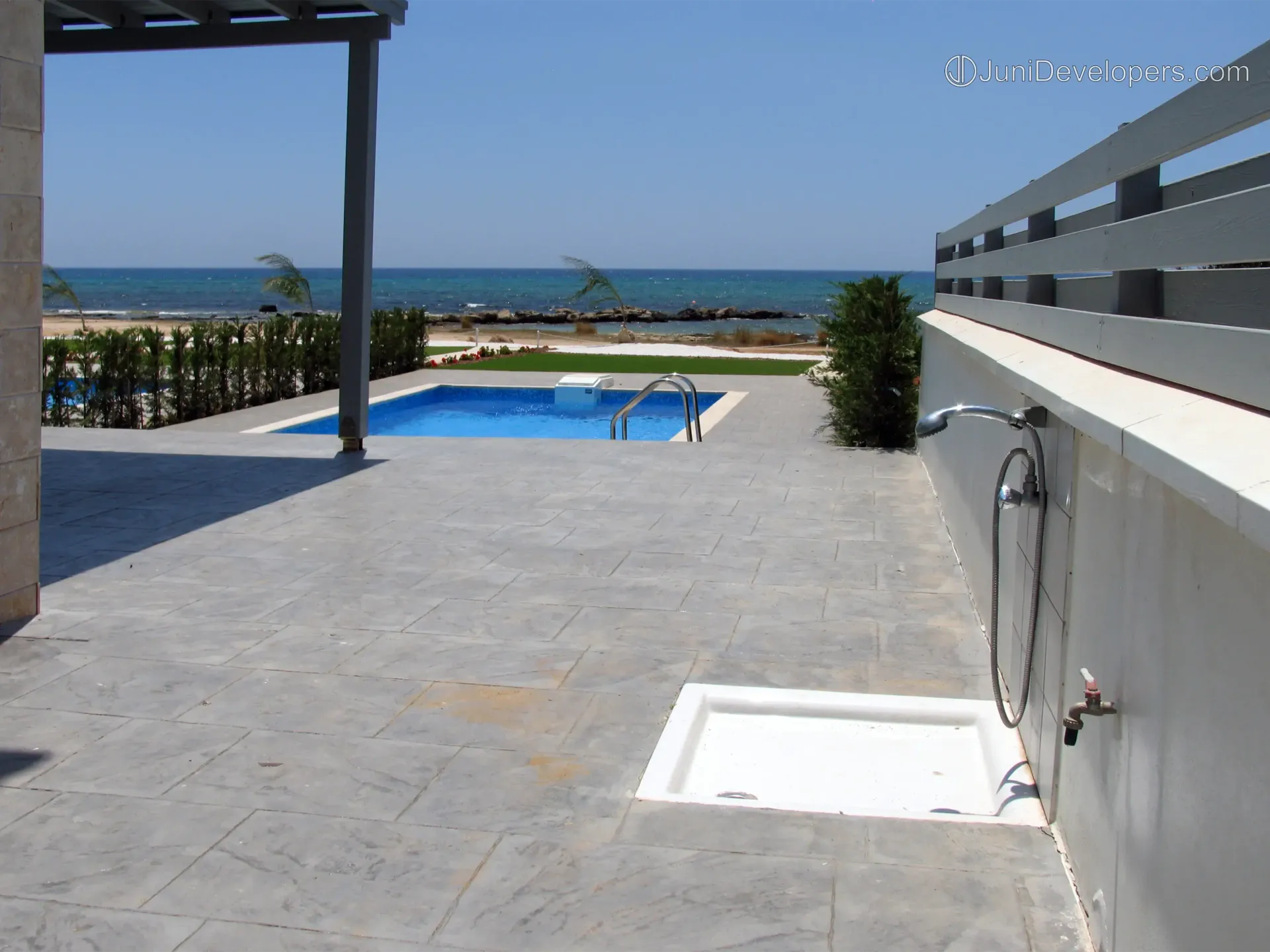 Beachfront villa in Ayia Napa resort area with garden and sandy beach
