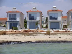 Beachfront villa in Ayia Napa resort area with large swimming pool