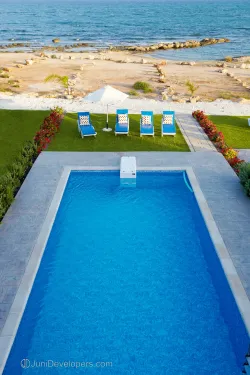 Seafront villa in Ayia Napa resort area with large swimming pool
