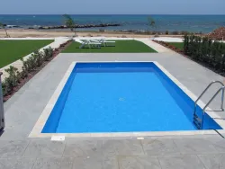 Beachfront villa in Ayia Napa next to the sea with large swimming pool