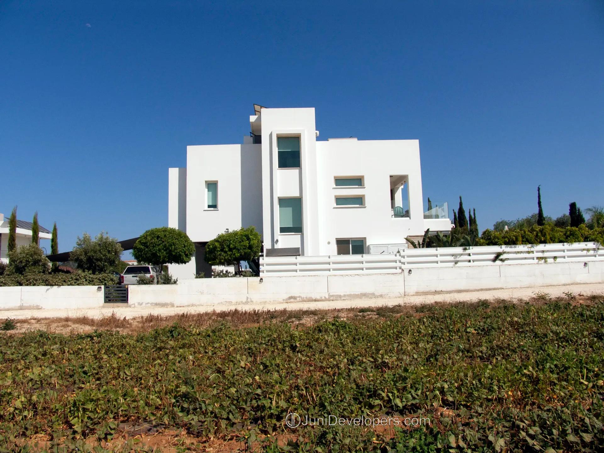 Contemporary spacious villa in Pernera seafront with expansive verandas and a secure garage